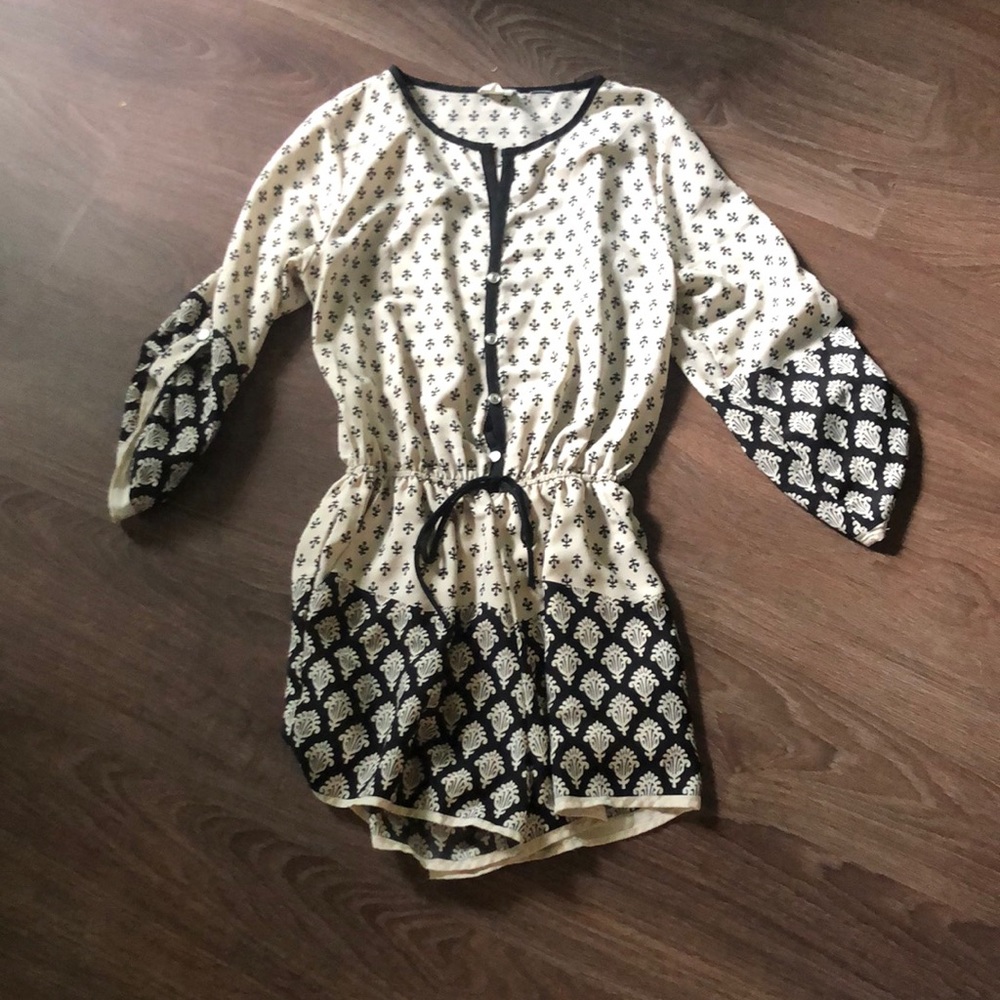 cream and black romper with 3/4 sleeves